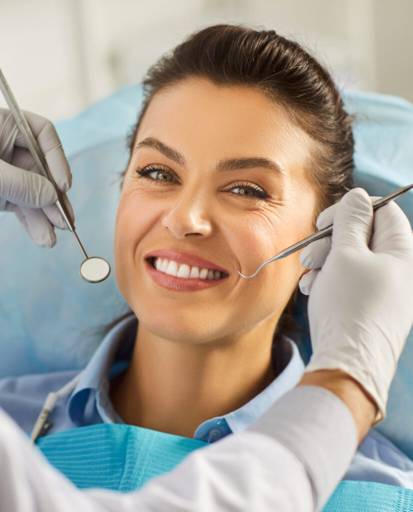 Dentist exam, teeth, gums, dental care exam, happy smiling woman healthy smile at doctor visit in clinic, demonstrating whitening teeth procedure result, satisfied with stomatology clinic service