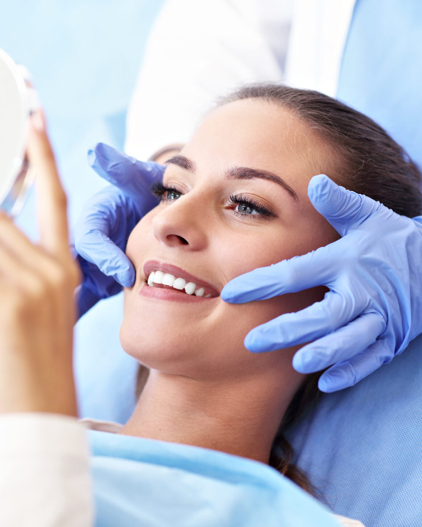 Picture of adult woman having a visit at the dentist's